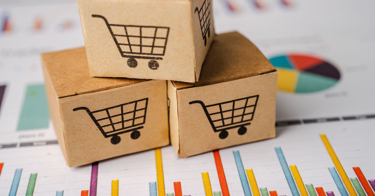 Carrinhos de e-commerce e gráficos representando métricas para e-commerce